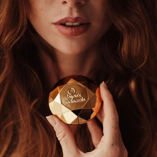Woman holding Bijoux Indiscrets Diamond massager
